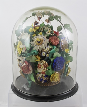 A VICTORIAN GLASS DOME AND BASE currently containing a selection of everlasting flowers in a basket,