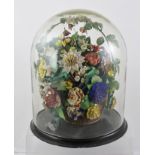 A VICTORIAN GLASS DOME AND BASE currently containing a selection of everlasting flowers in a basket,
