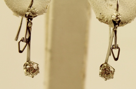 A PAIR OF DIAMOND AND WHITE GOLD COLOURED METAL SET DROP EARRINGS each having a claw set stone - Image 2 of 2
