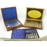 A LATE VICTORIAN MAHOGANY CASED SET OF SILVER PLATED DESSERT KNIVES AND FORKS FOR 12, the handles