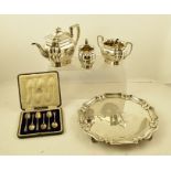 ATKIN BROTHERS A GEORGIAN DESIGN SILVER TEASET comprising; a salver shape tray on four scroll