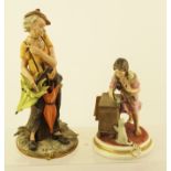 TWO CAPO-DI-MONTE PORCELAIN FIGURINES one signed by Nico Venzo, depicts a man with parasols, 26cm