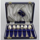 J** B** G** C** W** N** A SET OF TWELVE GEORGIAN BRIGHT CUT DECORATED SILVER TEASPOONS, monogrammed,