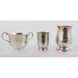 ELKINGTON & CO. A SILVER TANKARD of Georgian baluster form, with acanthus leaf mounted handles,