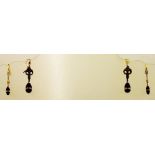 TWO PAIRS OF GILT METAL AND GLASS DROP EARRINGS, each with red and clear facetted beads on wire