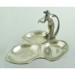 AN ART NOUVEAU WMF STYLE SILVER PLATED DISH, the handle modelled as a young woman in a classical