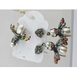 A PAIR OF SILVER COLOURED METAL AND ENAMEL INSECT EARRINGS each with a fly with red eyes and pearl