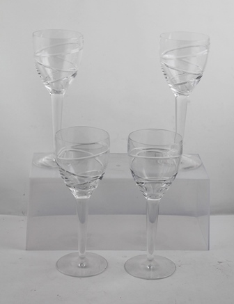 A SET OF FOUR STEMMED WINE GLASSES, designed by Jasper Conran for Stuart Crystal, 25.5cm high