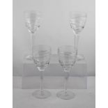 A SET OF FOUR STEMMED WINE GLASSES, designed by Jasper Conran for Stuart Crystal, 25.5cm high