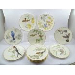 THE COMPLETE SET OF TWELVE ROYAL WORCESTER "BIRDS OF DOROTHY DOUGHTY" DESSERT PLATES, includes "