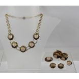 A CHINESE GOLD COLOURED METAL SUITE OF JEWELLERY, comprising necklace, bracelet, brooch, earrings