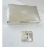 A LATE VICTORIAN SILVER BUCKLE with chased acanthus leaf decoration, London 1900, 5.5cm x 4.5cm,