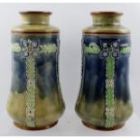 A PAIR OF ROYAL DOULTON STONEWARE VASES of tapering form with piped Art Nouveau stylised leaf and