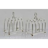 WEST & SON A PAIR OF VICTORIAN SILVER FOUR-SLICE WIRE TOAST RACKS, each having a central shaped