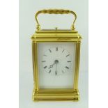 AN EARLY 20TH CENTURY FRENCH GILT BRASS CARRIAGE CLOCK, having 8-day mechanism with platform lever