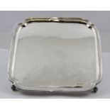 EDWARD VINER A RECTANGULAR SILVER SALVER, having applied moulded wire rim and re-entrant corners,