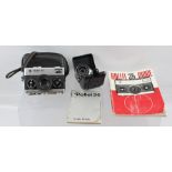 A "ROLLEI 35" CAMERA with case and booklets, together with a cased "AGFA TULLY" FLASH. (The Rollei