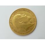 A 1909 GOLD HALF SOVEREIGN