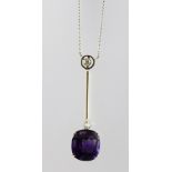 AN AMETHYST AND DIAMOND PENDANT NECKLACE with white gold chain set one old cut diamond above a plain