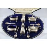 E S BARNSLEY & CO A GEORGE V SILVER DOUBLE CONDIMENT SET in presentation case comprising; a pair
