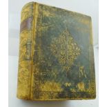 A LEATHER BOUND FAMILY BIBLE, includes the Old and New Testaments, illustrated with engravings,