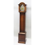 AN "ENFIELD" 1930'S GRANDMOTHER CLOCK, have an oak case with arch top hood, brass dial with silvered