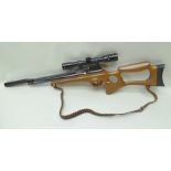 A PRE CHARGE "FALCON" AIR RIFLE with moderator calibre .22, and "NIKKO GOLD CROWN" 4X32 SCOPE,