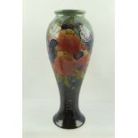 A MOORCROFT VASE, "Finches" pattern, of slender baluster form with tube lined and painted