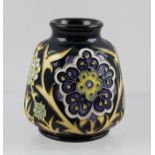 A MOORCROFT CERAMIC VASE, designed by Nicola Slaney, tube lined and hand painted in the "Florian