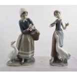 TWO LLADRO FIGURINES depicting goose girls, one with a basket over her arm, the tallest 24cm