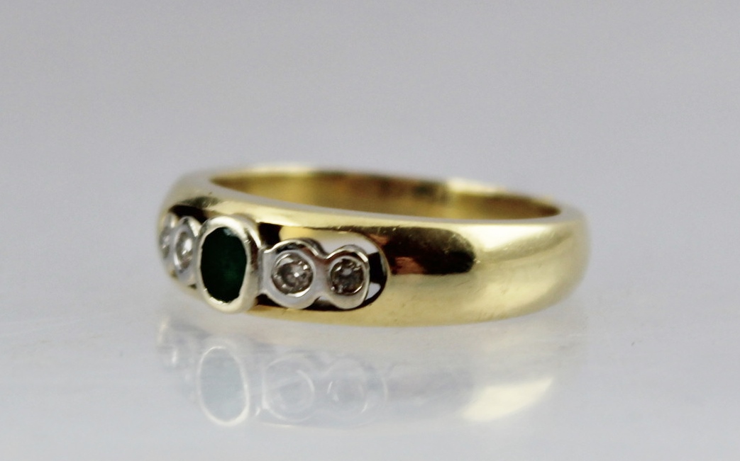 A 9CT GOLD GYPSY STYLE RING inset with an emerald and four diamonds, stamped .585, size R, gross - Image 2 of 3