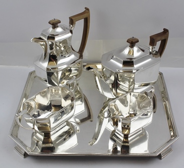 HAMILTON & INCHES A FIVE-PIECE SILVER TEA SET of rectilinear and canted form with applied