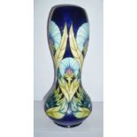 A MOORCROFT VASE, "Windsor Carnation" pattern, limited edition 203/300, of gourd shape, having