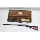 A FABRIQUE SIDE-BY-SIDE DOUBLE BARREL 12-BORE SHOTGUN no. 28954, in BSA shotgun case with