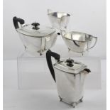 HARRISON BROTHERS & HOWSON (George Howson) AN ART DECO INSPIRED FOUR-PIECE SILVER TEA SET,