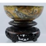 A MEIJI PERIOD JAPANESE SATSUMA BOWL, the interior painted with warriors at a shrine, the outside