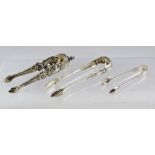 A PAIR OF SCOTTISH "QUEEN'S" PATTERN SILVER SUGAR TONGS, Glasgow 1855, and TWO OTHER PAIRS, one