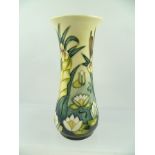 A MOORCROFT WAISTED VASE, circa 1995, "Water Lily" pattern, with flag iris's and bulrushes to the