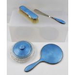 ADIE BROTHERS LTD A SILVER AND BLUE GUILLOCHE ENAMEL PART DRESSING TABLE SET comprising; hand