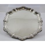 WALKER & HALL A SILVER DRINKS TRAY having heavy cast scallop and fancy scroll border, un-engraved