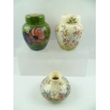 A MOORCROFT GINGER JAR AND COVER, "Clematis" pattern, on green ground, 15cm high, together with