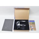 A BOXED "CONNOISSEUR CORKSCREW" with separate foil cutter, extra screw and instructions