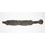 AN EARLY 19TH CENTURY POLYNESIAN CARVED HARDWOOD PADDLE CLUB having sword style handle with large