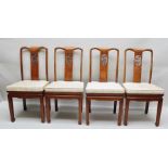 A WELL MADE 20TH CENTURY CHINESE HARDWOOD DINING SUITE, the extending table closes to a circle,