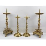 TWO PAIRS OF 17TH CENTURY DESIGN BRONZE PRICKET CANDLESTICKS, tallest pair 38cm high to tip of the