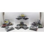 VITESSE DIE-CAST MODELS OF VW BEETLES in acrylic display cases some with figures (13) and a Saico