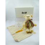 A STEIFF MOHAIR TEDDY BEAR "Ludwig" fitted musical movement, button and yellow tag in ear, with