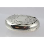 MAKER'S MARK RUBBED AN OVAL CUSHION SHAPED SILVER TACK BOX having scroll engraved decoration and