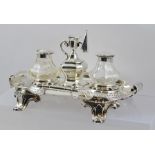 HENRY WILKINSON A VICTORIAN SILVER DESK STAND having central taper holder and snuffer, twin