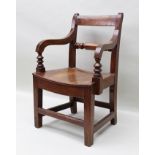 A LATE 19TH CENTURY PROVINCIAL CHILD'S OPEN ARMCHAIR with shaped back bar, on squared supports, with